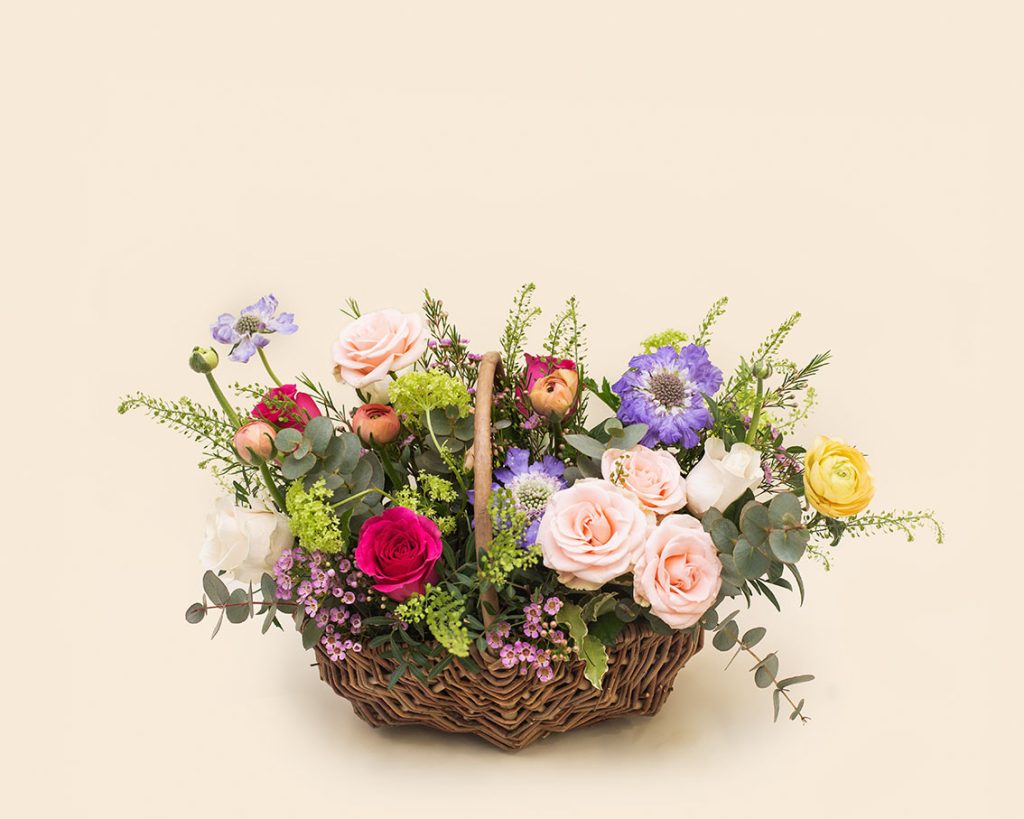 Basket with countryside flowers